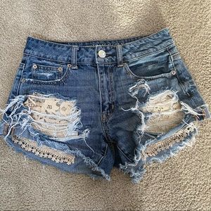 American Eagle ripped festival shorts